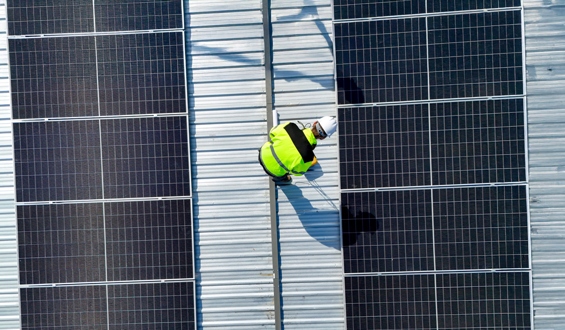 Aerial view of solar panel maintenance