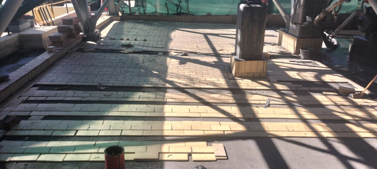 Acid brick lining installation in progress