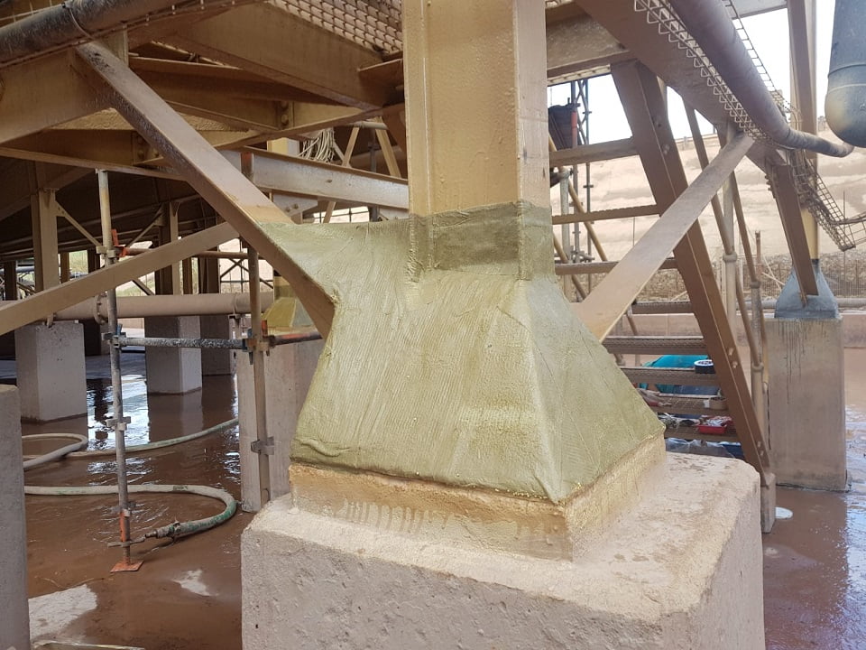 Column baseplate fully encapsulated with protective glassflake-style system