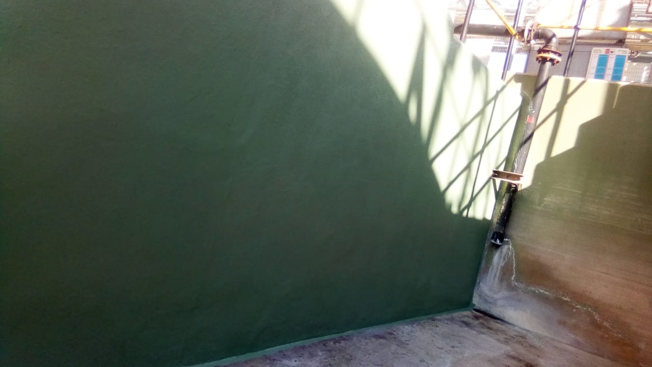 Two-tone bund lining at acid plant containment area