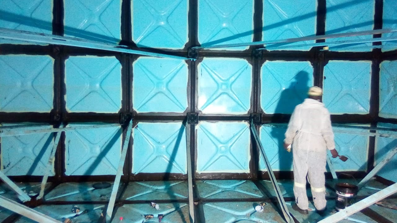 Sectional water tank internal lining application