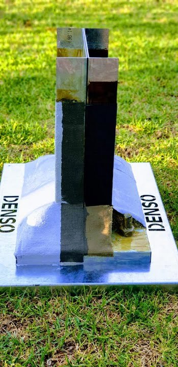 Denso-wrapped baseplate showcase highlighting layered protection system
