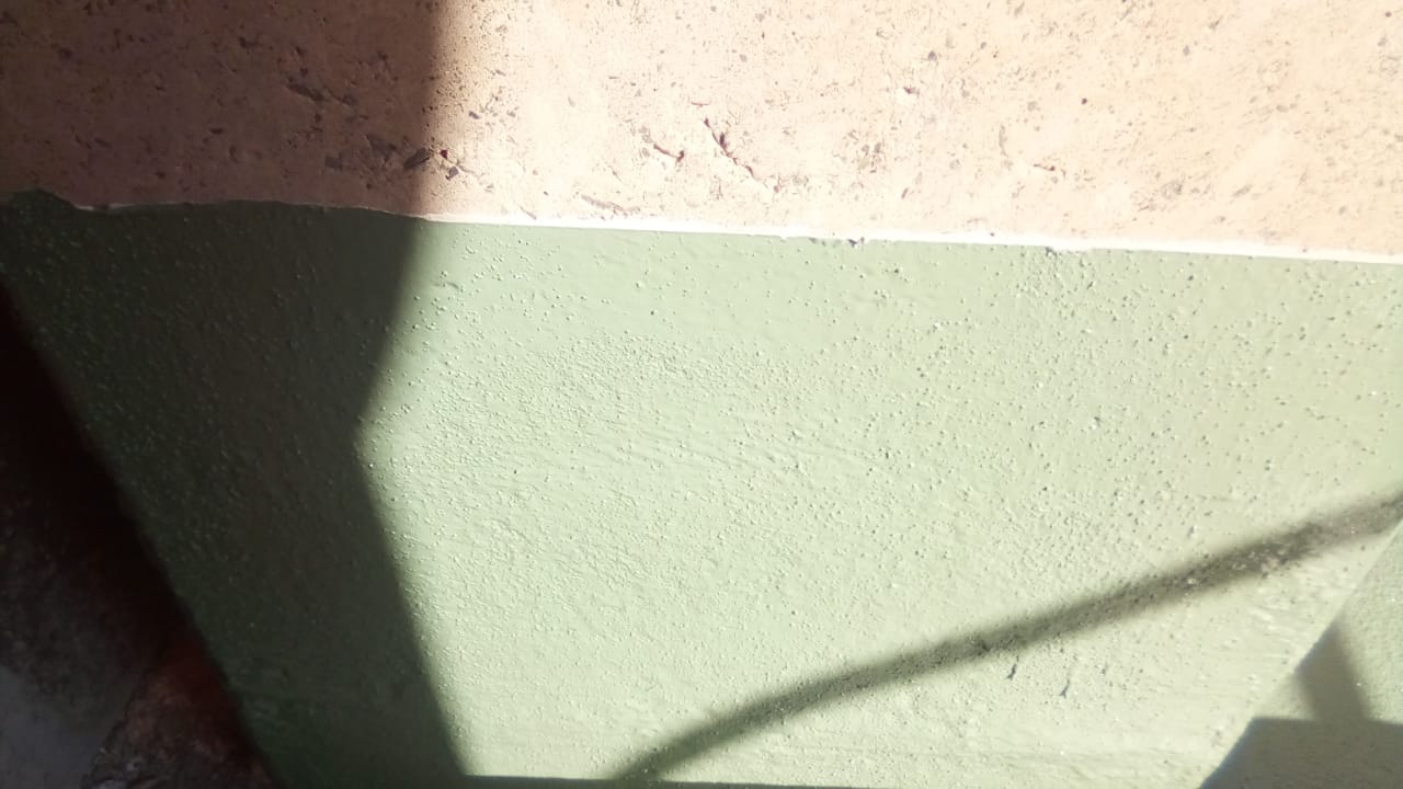 Close-up of textured acid-resistant coating finish