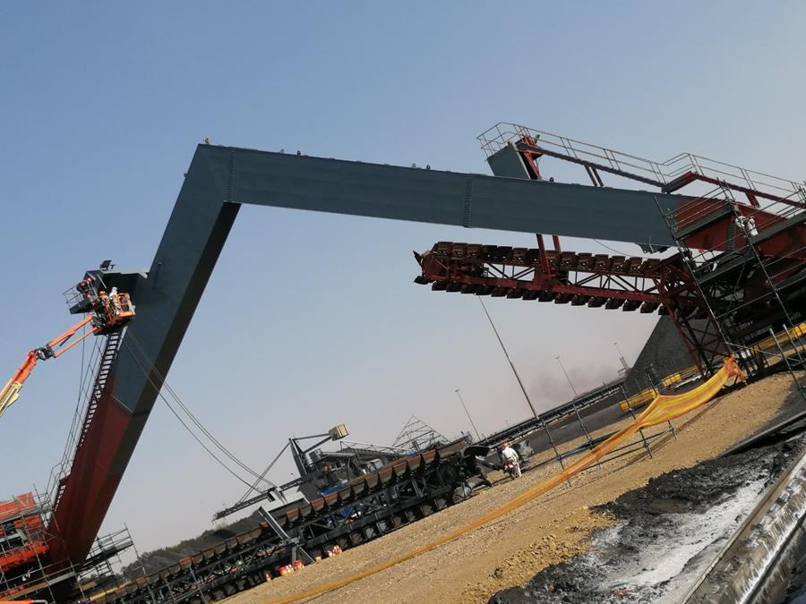 Stacker boom recoated in dark grey from MEWP access platform