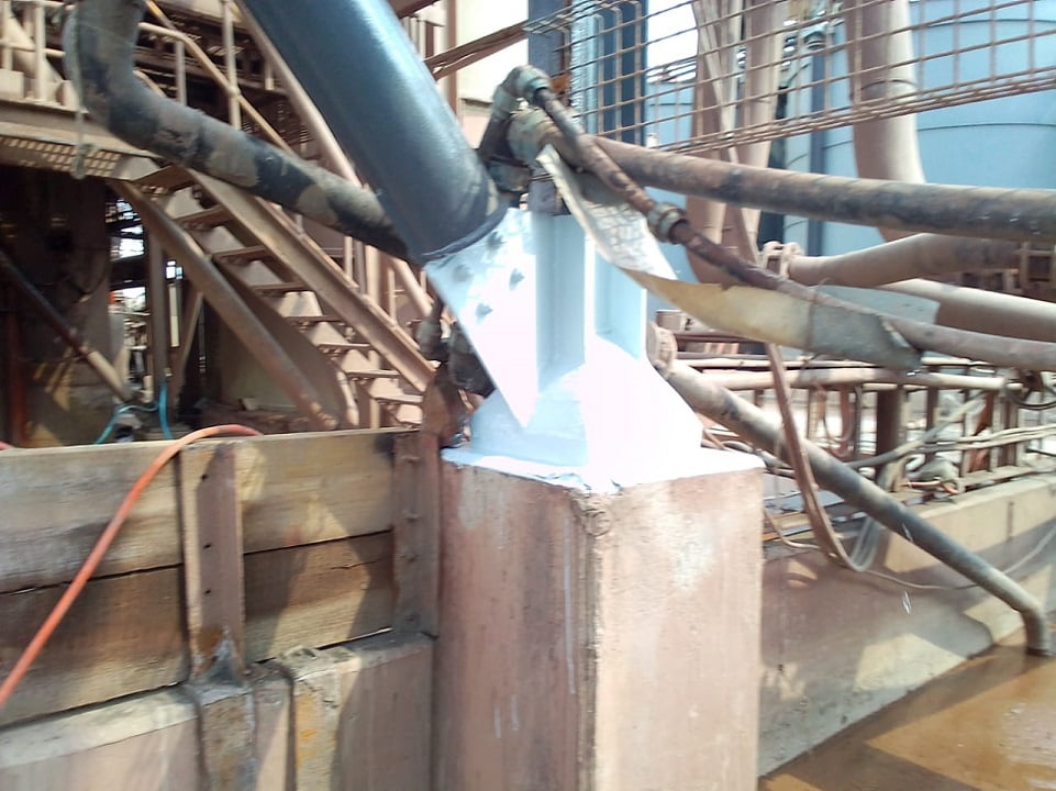 Coated structural column base with denso protection in process area