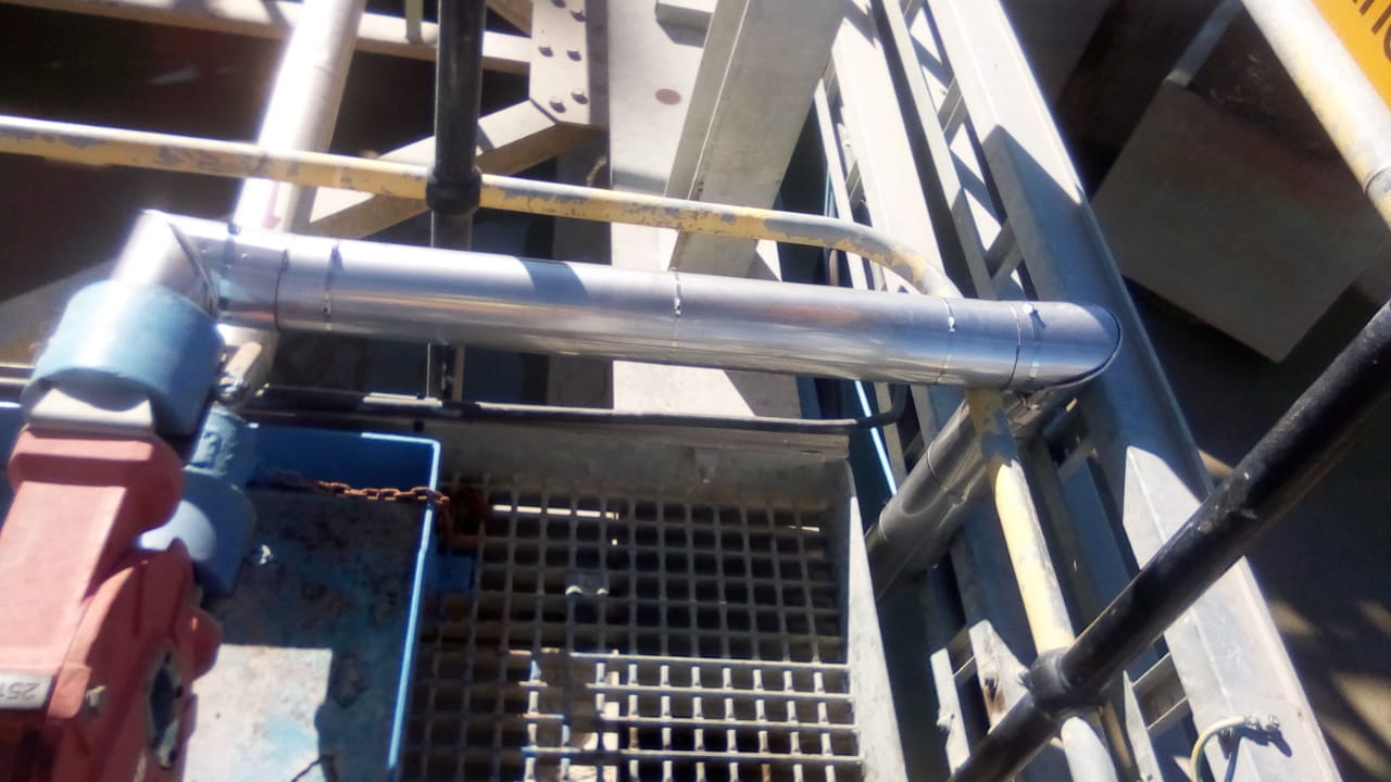 Lagged and clad pipework running through plant access platform