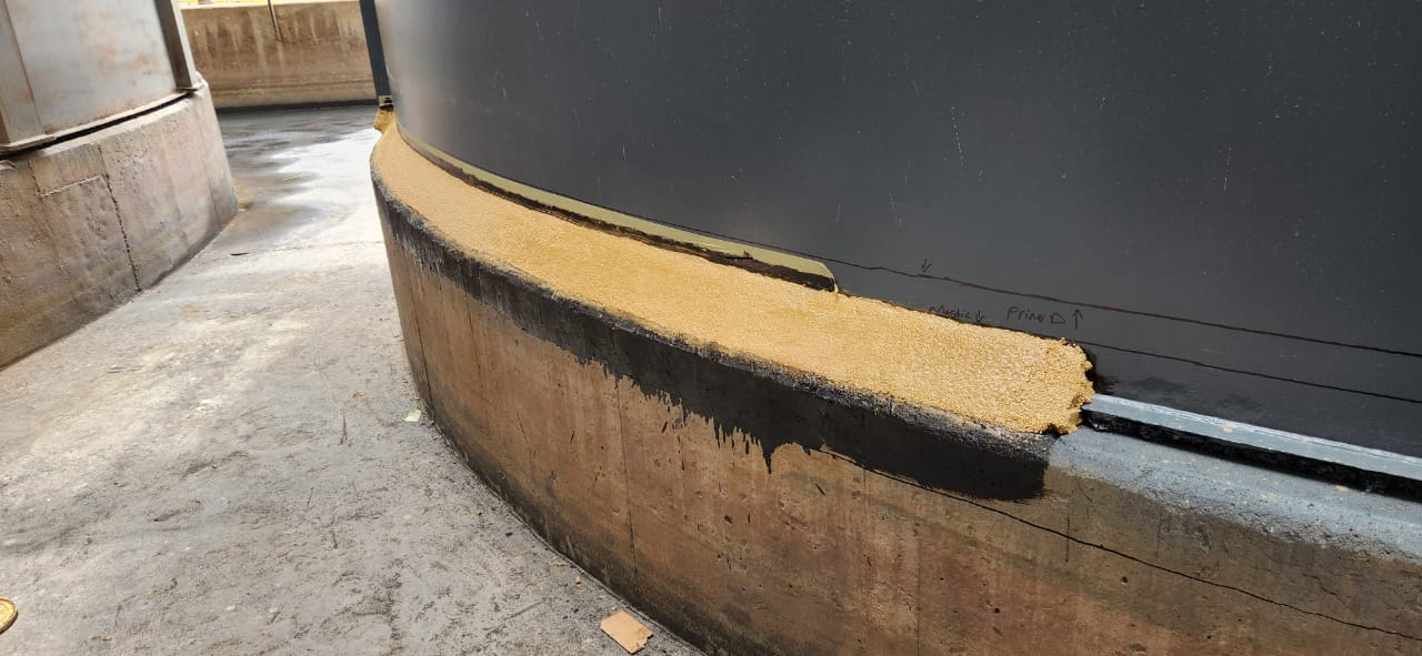Primer and base coat application on tank plinth