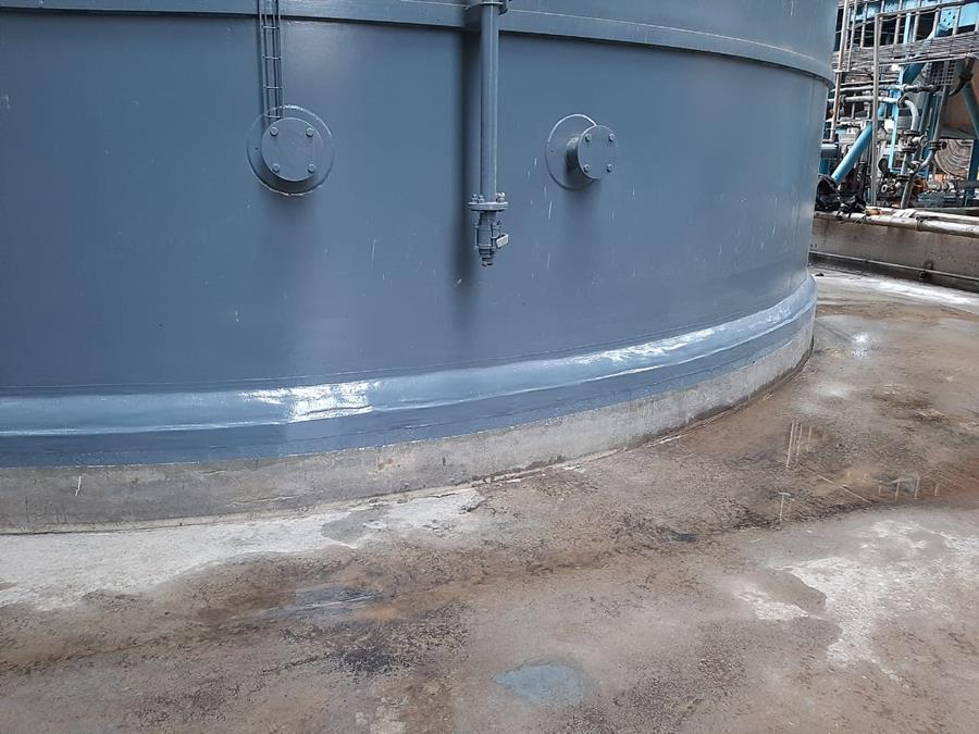 Close-up of newly coated process tank skirt with smooth grey finish