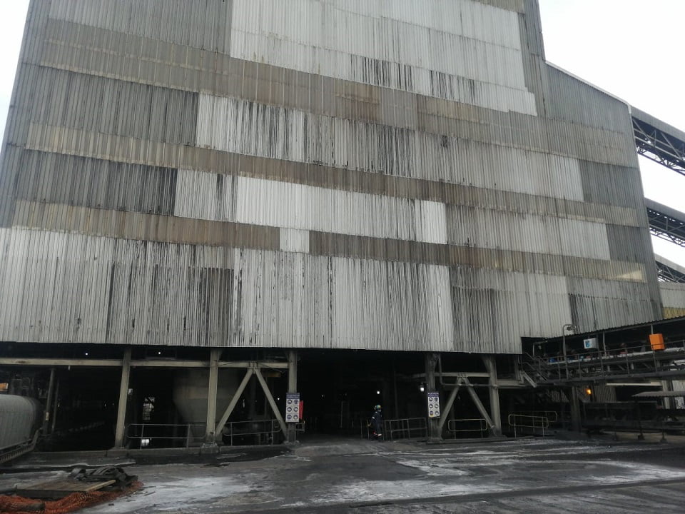 Industrial building cladding scheduled for asbestos sheet replacement