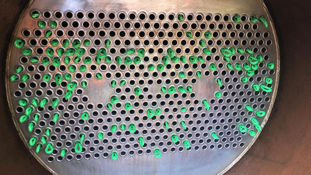 Tube bundle cleaning in progress with jetting lances inserted