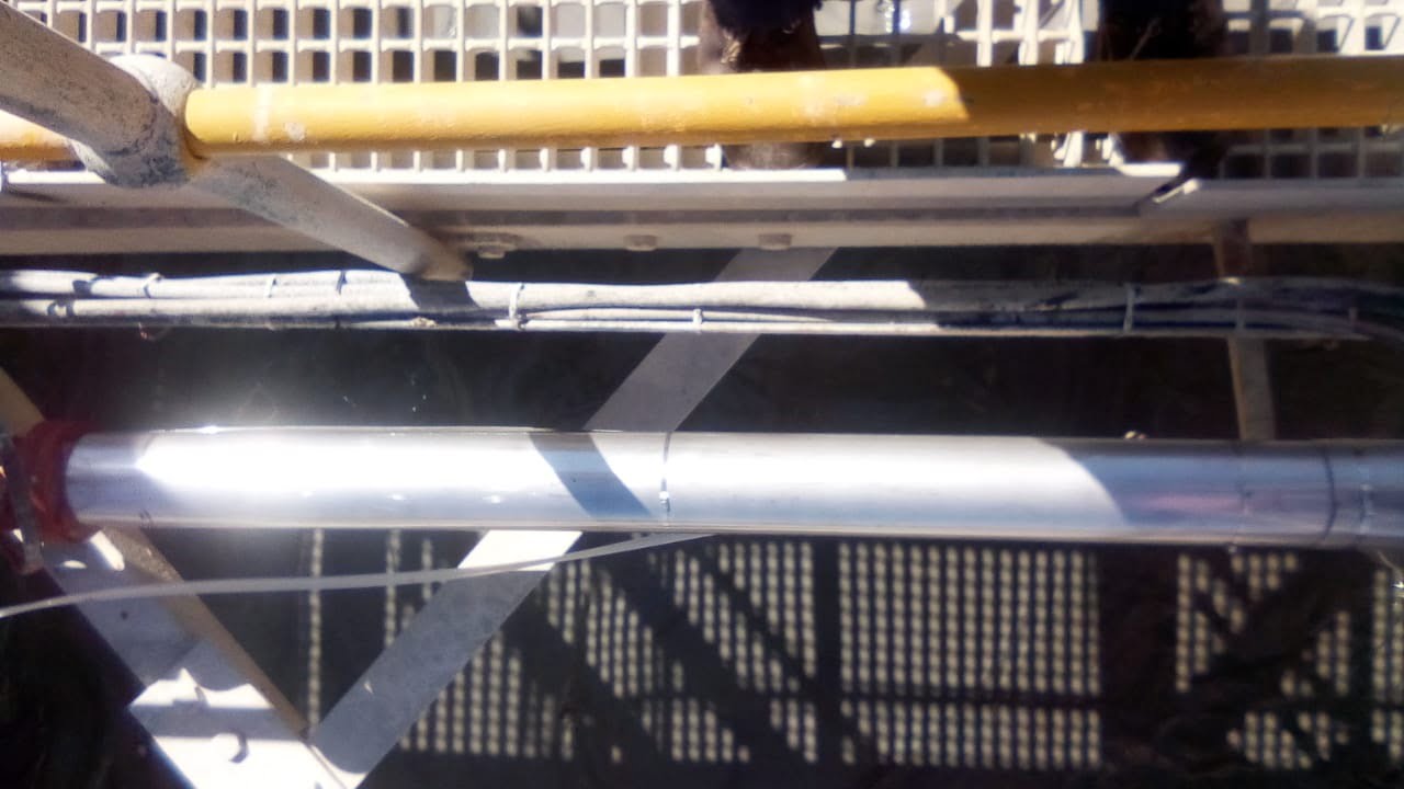 Close-up of insulated and clad pipe with weather-tight seams