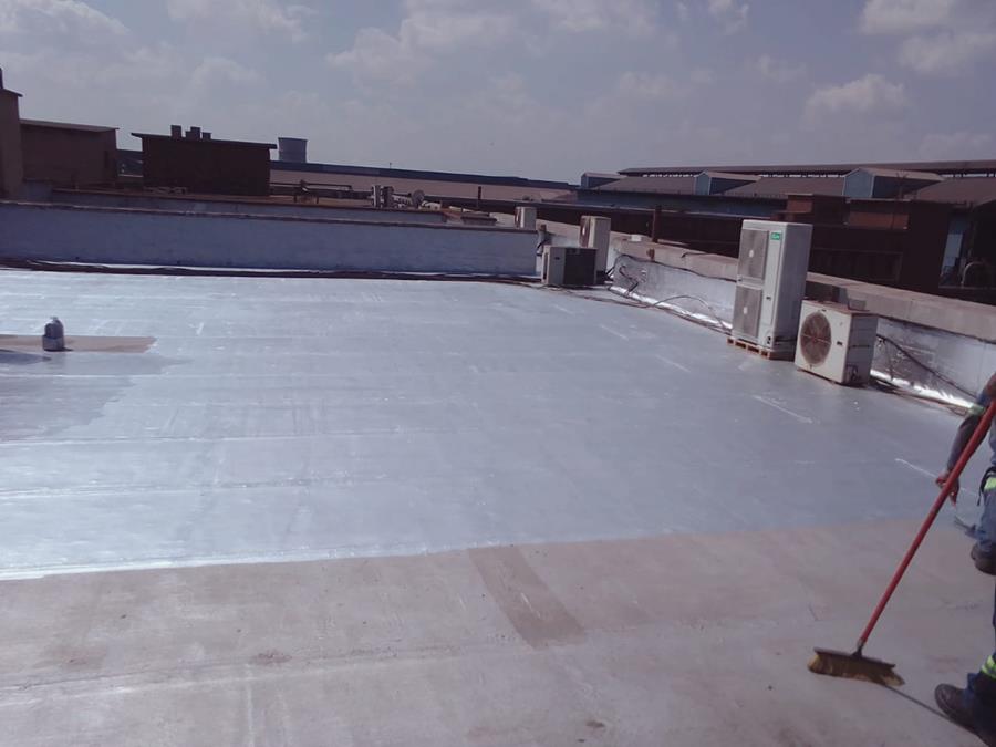 Completed waterproof membrane on flat industrial rooftop