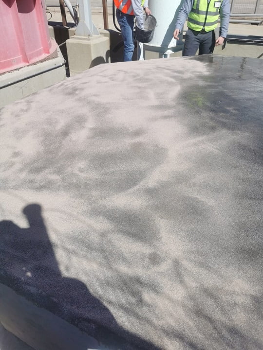 Primer coat applied to bund surface