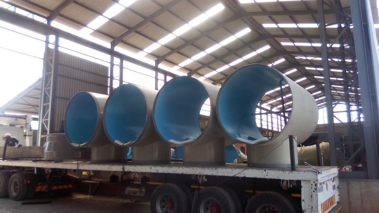 Internally lined large-diameter pipe spools loaded for dispatch