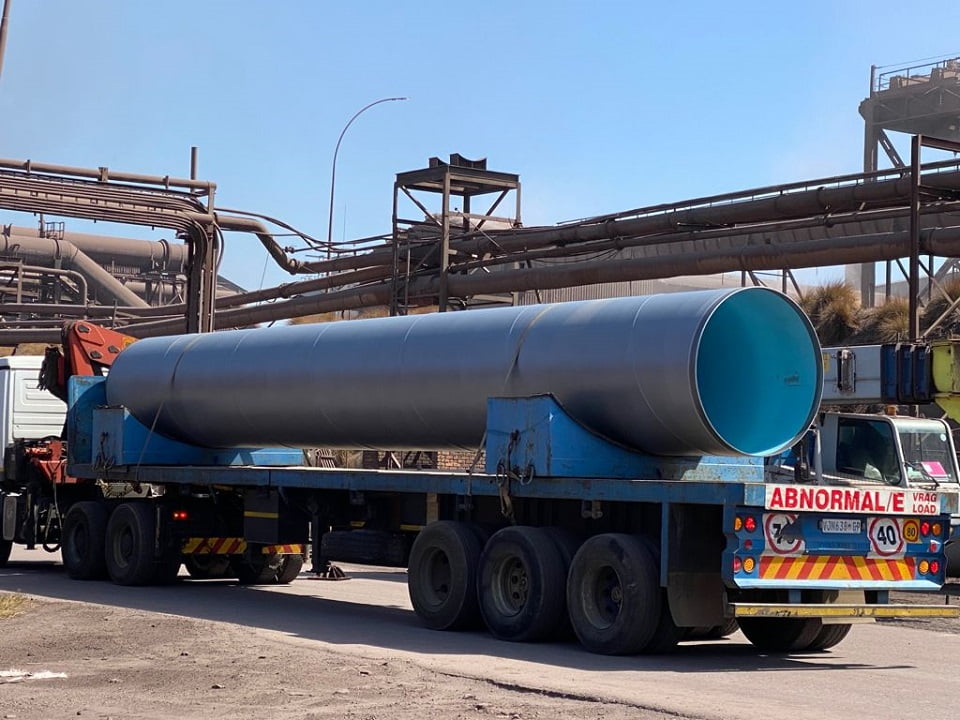 Large-diameter fabricated pipe section on abnormal-load transport
