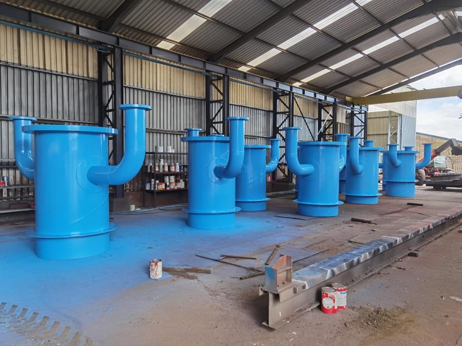 Bank of fabricated and coated process vessels in vibrant blue finish