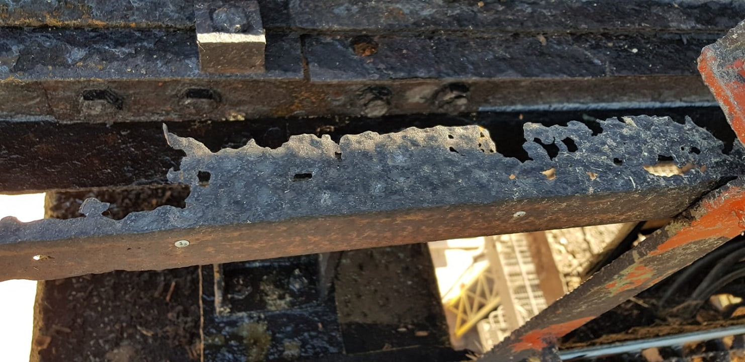 Corrosion damage on structural steel highlighting need for protective coatings