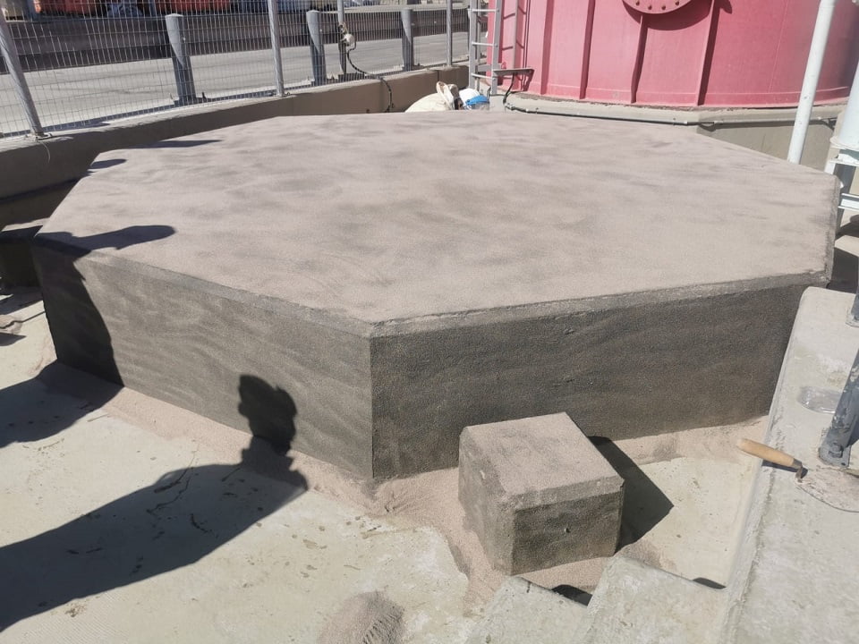 Cured intermediate coating on octagonal plinth
