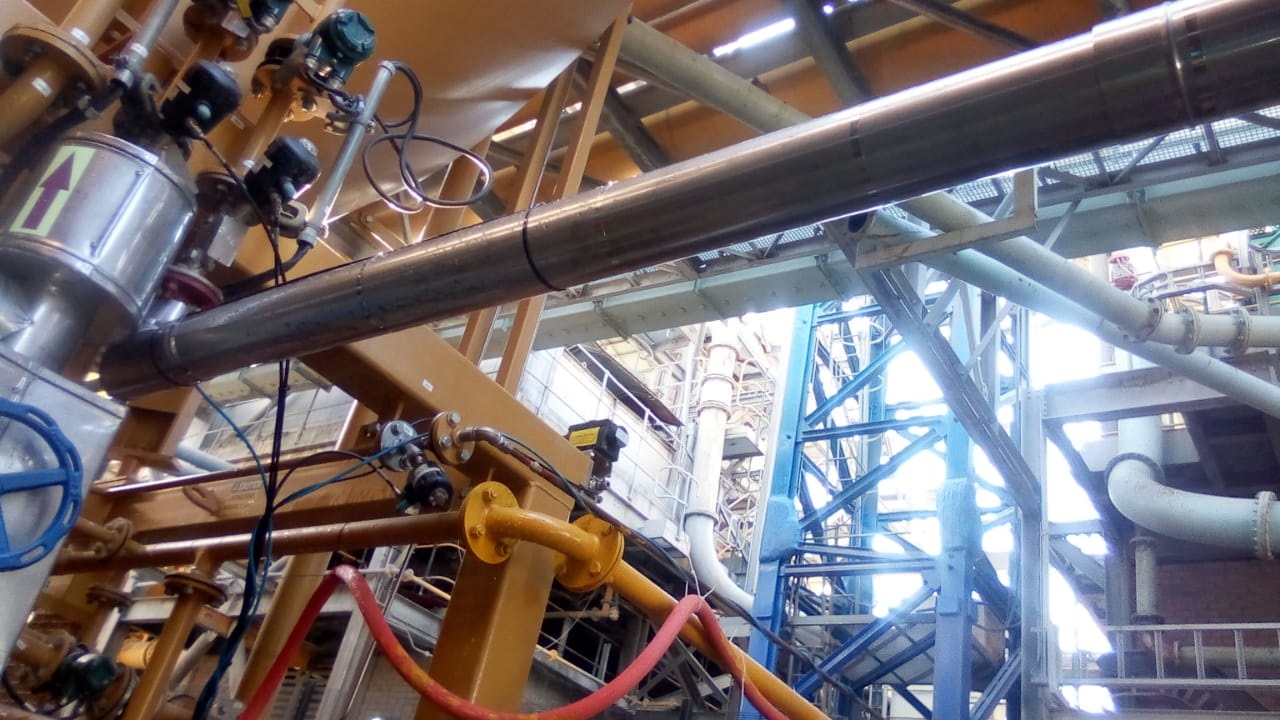 Long run of clad and lagged pipework through process area